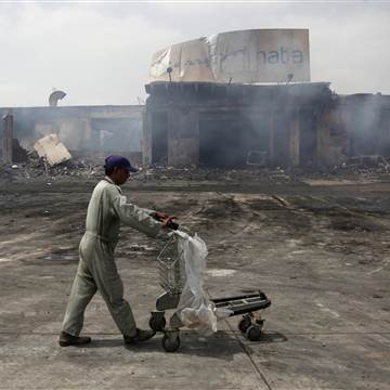 Image: Militant attacks are fairly common in Karachi, such as the 2014 battle that destroyed buildings at the city's international airport