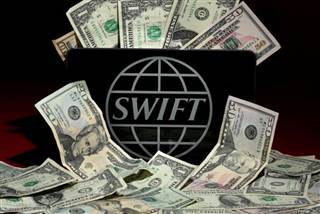 Photo illustration of the SWIFT logo