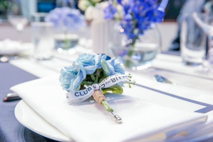 Guests were given blue boutonnieres and bracelets to wear during the party. Like most of the décor, they were signature Samsung blue.