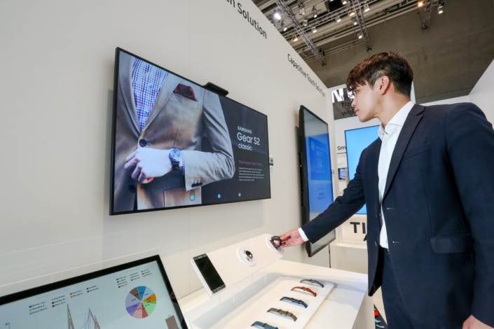 Customers can interact with the sensor-integrated touch screen display to learn more information about the selected product.