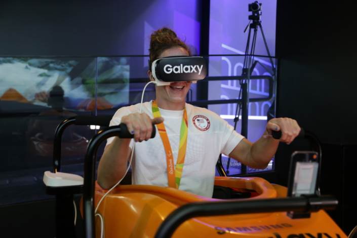 Team USA Paralympic Track and Field Athlete, Tatyana McFadden, is all smiles as she experiences the high-speed thrill of simulated Olympic kayaking through 4D motion virtual reality at the Samsung Galaxy Studio Olympic Park in Rio de Janeiro, Brazil on September 10th, 2016. The film is displayed through the Samsung Galaxy smartphone and Gear VR.