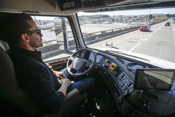 Image: Matt Grigsby, senior program engineer at Otto, takes his hands off the steering wheel