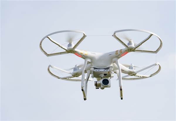 Image: White drone flying