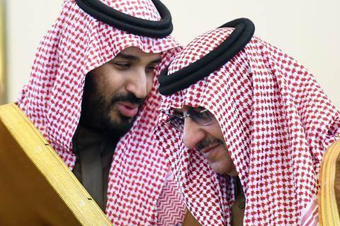 Image: Saudi Defense Minister Mohammed bin Salman, left, talks with Interior Minister Mohammed bin Nayef during the Gulf Cooperation Council summit in the Saudi capital Riyadh on Dec. 9, 2015.