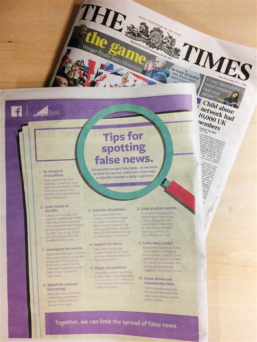 Image: Full page Facebook ad teaching people to spot fake news