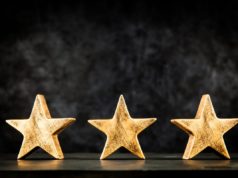 Why enterprises depend on JavaScript, Python, and Java 3 stars, award, dark background