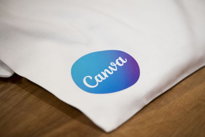 Canva logo on bag sitting on a table.