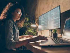 TypeScript 5.7 improves error reporting Profile side photo of concentrated skilled web expert afro american girl sit evening desk use computer netbook work java script html back-end algorithm in workstation workplace