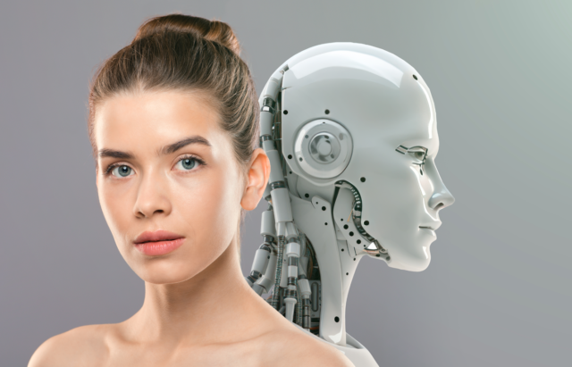 Image of a woman with a humanoid robot at the back.