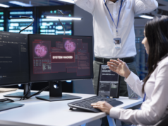 85 Victims and Counting: What To Know About FunkSec Ransomwa… IT professional working on a station that