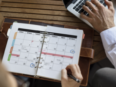 ChatGPT Now Includes Agentic AI Task Scheduling Hand writing on a planner and another one using a laptop.