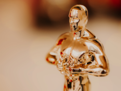 Oscars Set New AI Disclosure as Generative Tech Creeps Into … Closeup shot of the Oscar trophy.