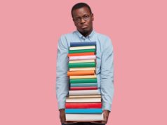 Did Zuckerberg’s Meta Steal Work to Train Its AI? Writers, A… Photo of displeased businessman holds pile of scientific books.