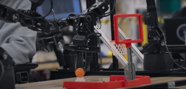 Google Gemini 2.0 robot playing basketball.