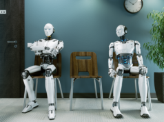 AI Agents Could Soon Become Full-Time Virtual Employees Robots in a queue for a job interview.