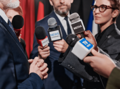 50% of Americans Say AI Will Have A ‘Very or Somewhat Negati… Journalist interviewing Businessman