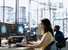 Study: AI Adoption Benefits Fall Short An employee working on AI technology.