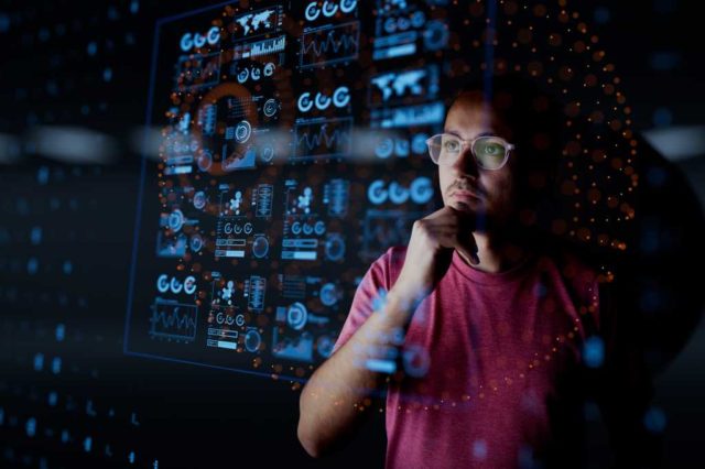 Google-touts-new-Python-client-library-for-Data-Commons.jpg Man look at the dashboard with graphs and charts. Concept of data management system, business intelligence, data statistics, marketing analysis, key performance indicators (KPI) and analytics.