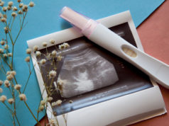 First AI-Assisted Pregnancy Offers Hope for Severe Male Infe… Ultrasound scan of an unborn baby of fifth week with a pregnancy test on the blue-pink background.