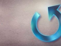 Generative AI dos, don’ts, and ‘undos’ Neon blue 'reload' arrow on a textured background.