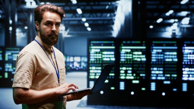 How-self-learning-AI-agents-will-reshape-operational.jpg Experienced engineer writing data center disaster recovery plan on laptop to provide rapid restoration of service, limiting disruption and minimizing interruptions to normal operations