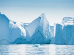 Why observability wants Apache Iceberg Big icebergs in Atlantic ocean, Ilulissat icefjord, western Greenland. Blue sea and the blue sky at sunrise
