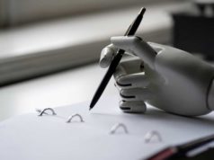 The rise up in opposition to robotic drivel artificial robotic arm write down some notes with pen