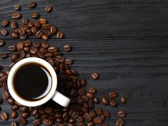Will JavaFX return to Java? Cup of coffee and fresh coffee beans on wooden background