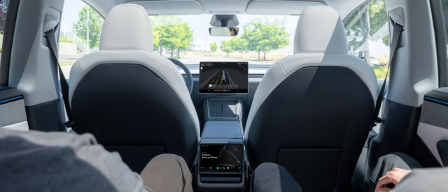 Elon-Musk-Says-Tesla’s-Robotaxis-Are-Days-Away-From-Going.png Tesla Robotaxi interior view.