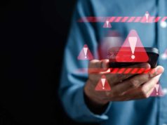 High severity flaw in MongoDB may permit reminiscence leakage System warning caution sign on smartphone, scam virus attack on firewall for notification error and maintenance. Network security vulnerability, data breach, illegal connection and information danger.