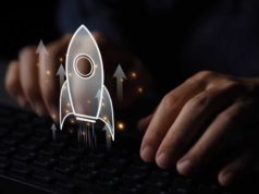 Spring Boot tutorial: Get began with Spring Boot A person works at a keyboard with a virtual overlay of a rocket launch.