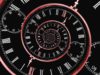 Back to the long run: The hottest JavaScript tales… Reversed infinity time spiral; a digital image of a stopwatch with a black background and red spiral representing infinity backward.