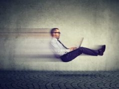 Claude Code is blowing me away businessman zooming through air with laptop