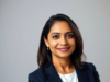 6 Claude Prompts to Create Better AI Images That Actually St… Professional corporate headshot of a confident South Asian woman in her early 40s, wearing a tailored navy blazer over a white blouse.