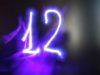 12 model-level deep cuts to slash AI coaching prices shutterstock 2147196669 glowing purple neon number 12 twelve on a dark matte glass background
