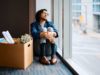 No, AI received’t destroy software program improvement jobs Sad entrepreneur sitting next to box of his belongings and looking through the window after being fired at work. Copy space.