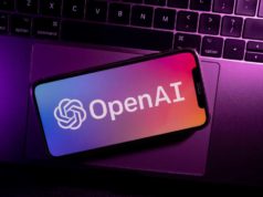 US tells OpenAI to limit entry to its strongest … Azores, Portugal - 21.01.2023: SmartPhone on top of laptop keyboard with OpenAI Logo on the screen.