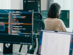 CrowdStrike identifies 5 new AI immediate injection… Group Adult Asia male, female freelance typing write prompt AI bot IT app smart program nomad, video game, terminal with coding language, user interface, designer, big data center on desktop computer.