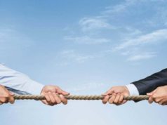 AI or conventional cloud providers? Tug war, two businessman pulling a rope in opposite directions isolated on white background